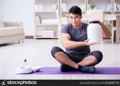 Man with food supplements in sports and healthy lifestyle concept. Man with food supplements in sports and healthy lifestyle concep