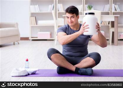 Man with food supplements in sports and healthy lifestyle concept. Man with food supplements in sports and healthy lifestyle concep