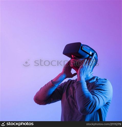 man with futuristic device medium shot