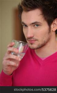 Man with glass of water
