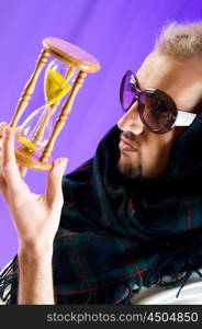 Man with glasses in studio shooting