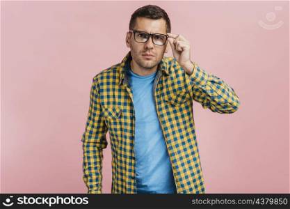 man with glasses looking curious