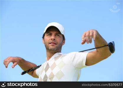 Man with golf club