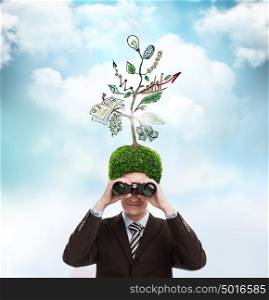 Man with green tree growing instead of hair. Environment friendly business concept
