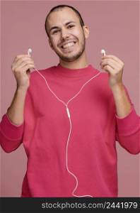 man with headphones laughing 5