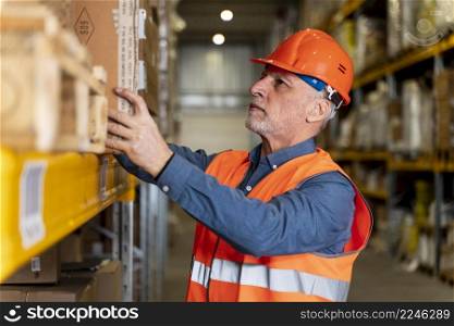 man with helmet working warehouse 3. man with helmet working warehouse 2