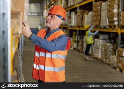 man with helmet working warehouse 4. man with helmet working warehouse 3