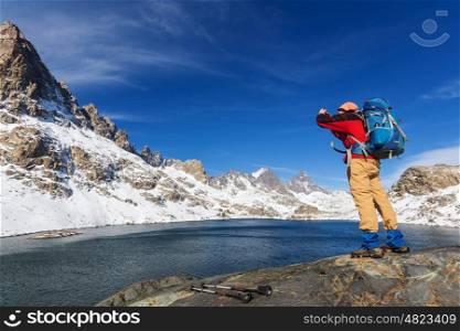 Man with hiking equipment walking in Sierra Nevada mountains,California,USA