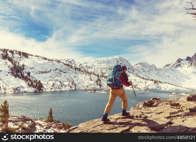 Man with hiking equipment walking in Sierra Nevada mountains,California,USA