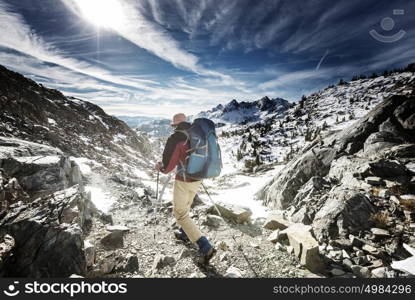 Man with hiking equipment walking in Sierra Nevada mountains,California,USA