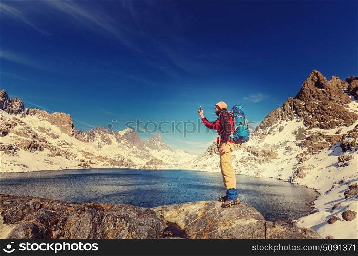 Man with hiking equipment walking in Sierra Nevada mountains, California, USA