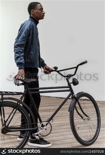 man with his bicycle wall 2