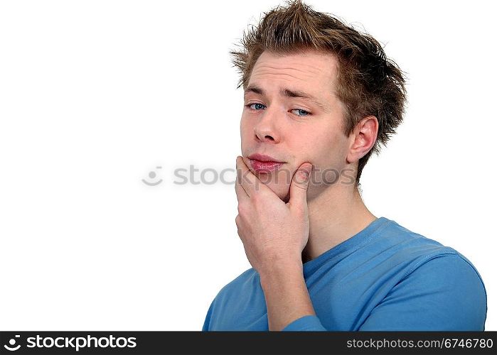 Man with his hand on his chin