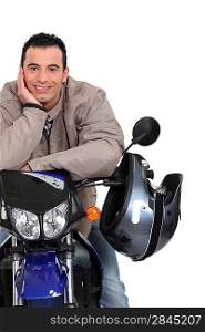 Man with his motorbike