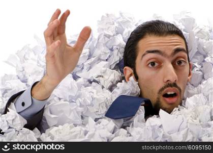 Man with lots of crumpled paper