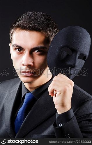 Man with mask in the dark