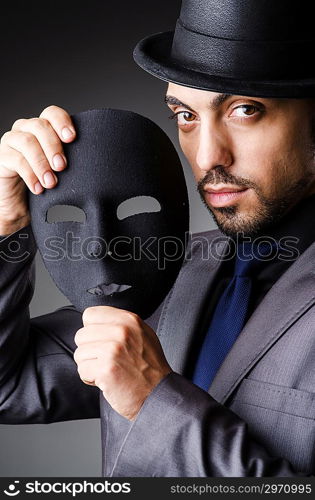 Man with mask in the dark