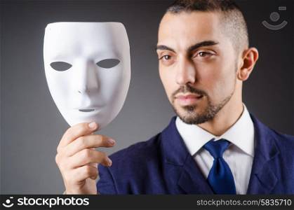 Man with mask in the dark