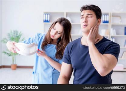 Man with neck injury visiting doctor for check-up