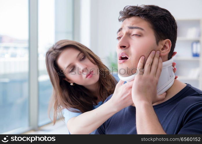 Man with neck injury visiting doctor for check-up