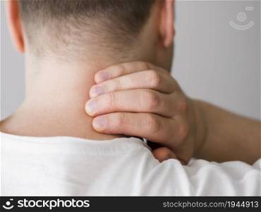 man with neck pain. High resolution photo. man with neck pain