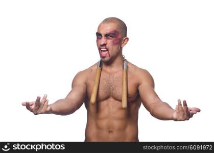 Man with nunchucks isolated on white