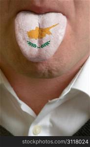 man with open mouth spreading tongue colored in cyprus flag as symbol of values like teaching, learning, multilingual speaking of different languages