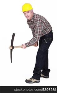 Man with pick ax