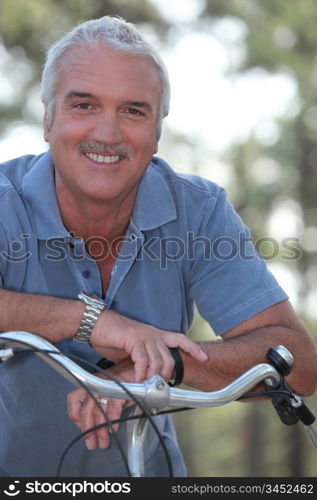 Man with push bike