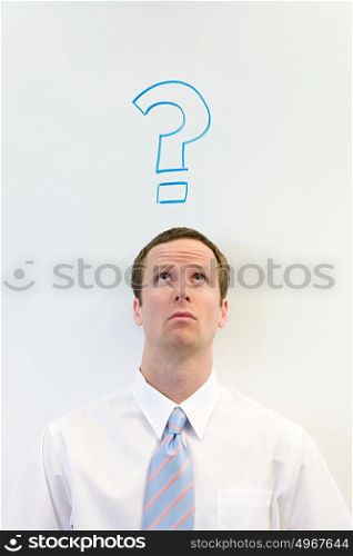 Man with question mark above his head