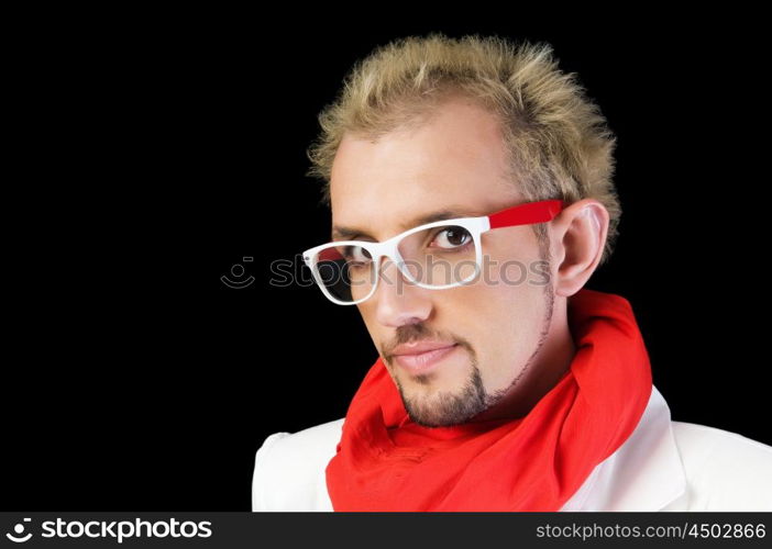 Man with red scarf on the black