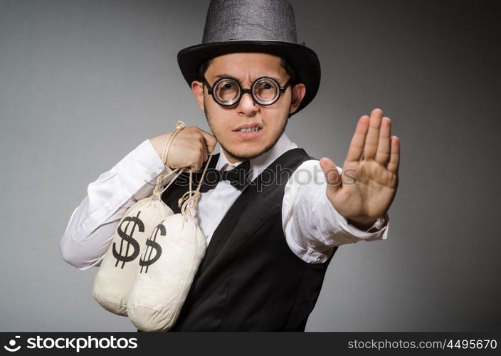 Man with sacks of money