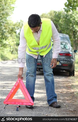 man with security triangle