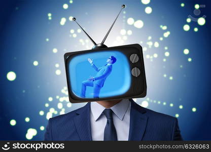 Man with television head in tv addiction concept