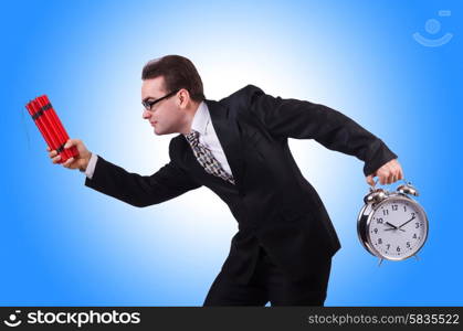 Man with time bomb isolated on white