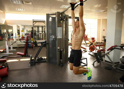 man with weight training equipment on sport gym club &#xA;&#xA;