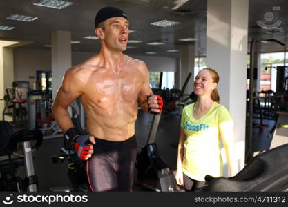 man with weight training equipment on sport gym club &#xA;&#xA;