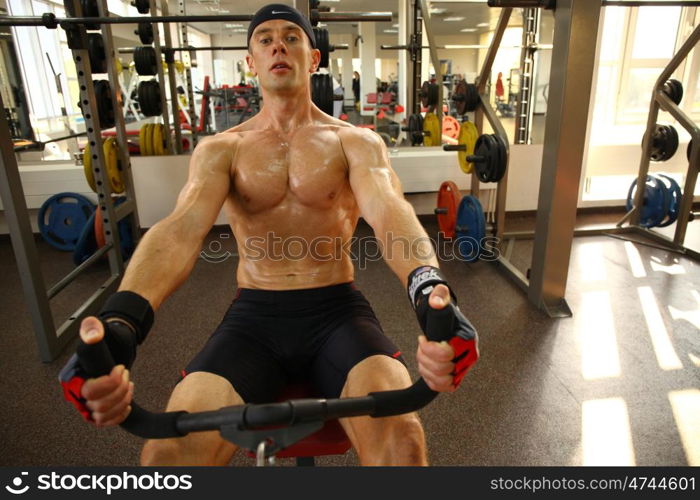 man with weight training equipment on sport gym club &#xA;&#xA;