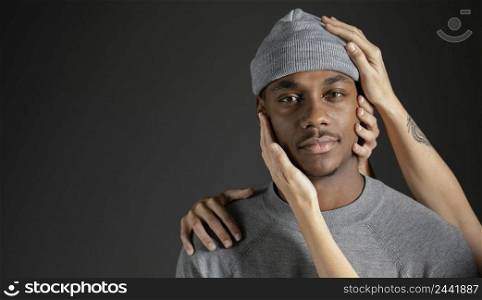 man with woman hand comforting him 2