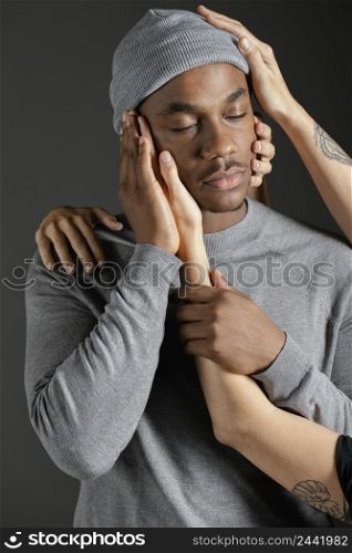 man with woman hand comforting him