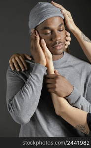 man with woman hand comforting him