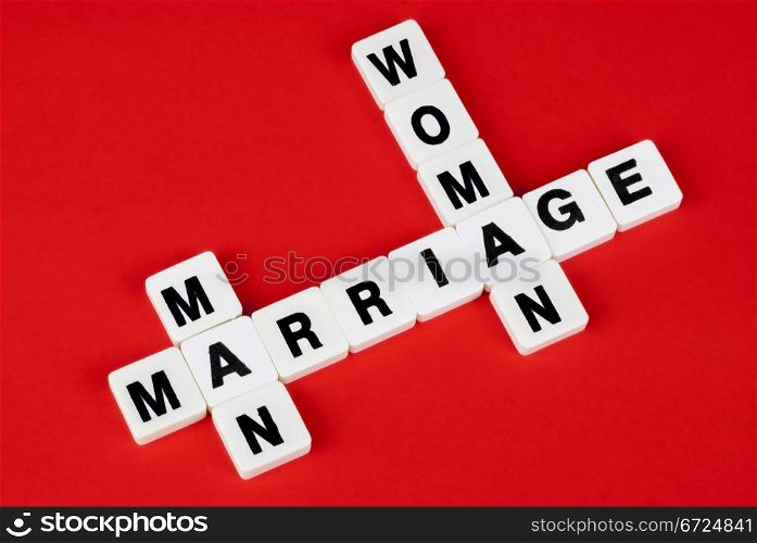 man, woman and marriage words on red background