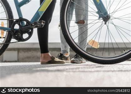 man woman legs bike