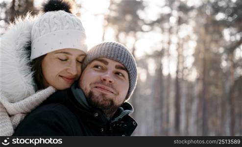 man woman together outdoors winter