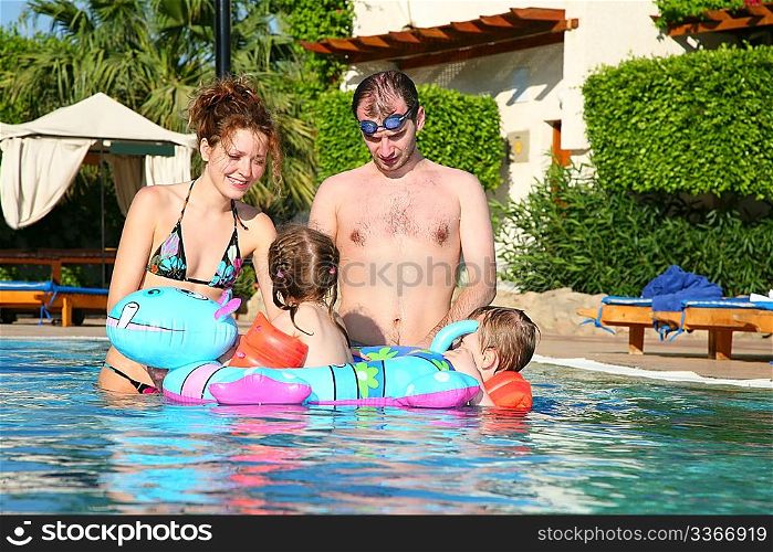 man women children pool