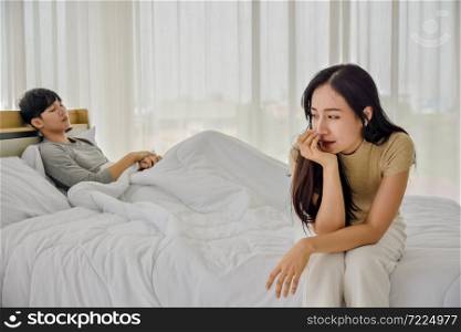 Man women living on bed room social distancing,Husband wife problem relationship