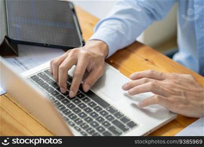 Man work from home. work online on laptop. Asian businessman working online business concept with social distancing laptop online meeting.