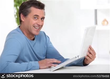 Man working at home via the internet