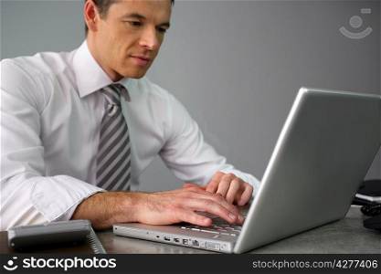 Man working away at his desk