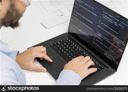 man working energy innovations his laptop 2